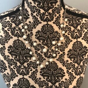 Pearly white color beaded necklace.